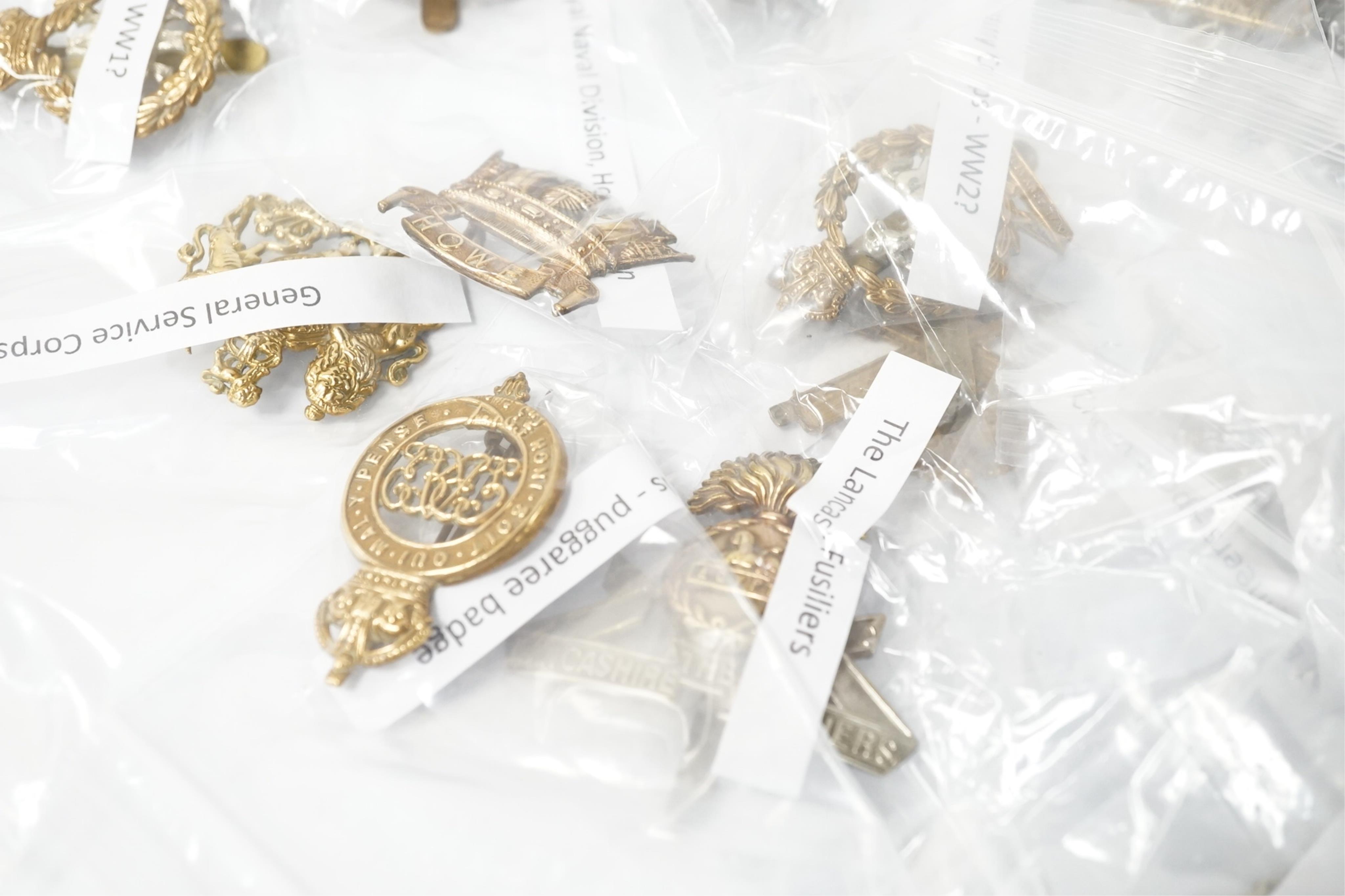 Fifty military cap badges, including; the Duke of Lancaster’s Own regiment, the Blues and Royals, Glider Pilot regiment, Sherwood Foresters regiment, Leicestershire regiment, Royal West Kent regiment, Inns of Court regim